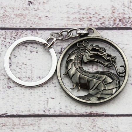 Брелок БКИМ 2010 Мортал Комбат логотип (серебро антик)