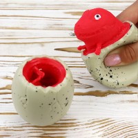 Іграшка антистрес Фуфлік Дракон червоний із бежевого яйця